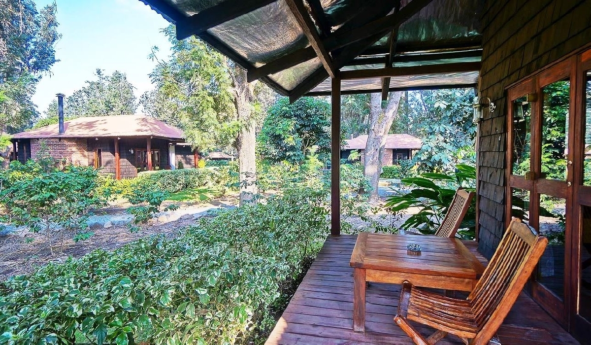 Terrasse d'un des cottages qui accueille les Plantation room au Arusha Coffee Lodge